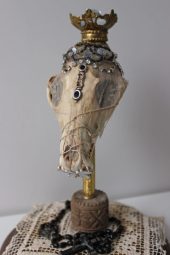 Fox Skull, Victorian era dress remnants, antique jewels, relics from Salzburg's castle, quartz crystal, antique rosary beads, antique lace, mixed media
